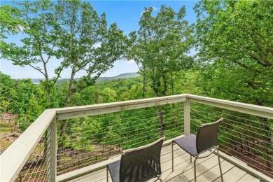 This stunning home offers privacy and views of Lake Arrowhead on The Highlands Course at Lake Arrowhead in Georgia - for sale on GolfHomes.com, golf home, golf lot