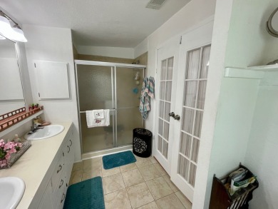 Check this out!! This home has been meticulously kept with on Water Oak Country Club Estates in Florida - for sale on GolfHomes.com, golf home, golf lot