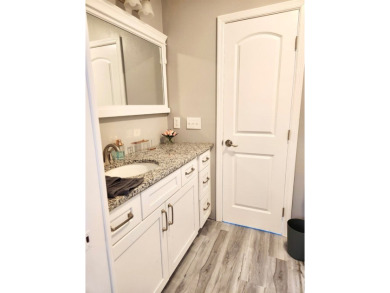 If you've been searching for a beautifully updated home in sunny on Lake Fairways Country Club in Florida - for sale on GolfHomes.com, golf home, golf lot