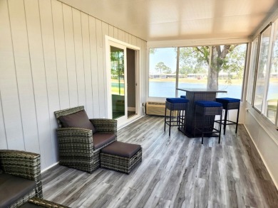 If you've been searching for a beautifully updated home in sunny on Lake Fairways Country Club in Florida - for sale on GolfHomes.com, golf home, golf lot