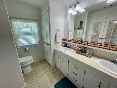 Check this out!! This home has been meticulously kept with on Water Oak Country Club Estates in Florida - for sale on GolfHomes.com, golf home, golf lot