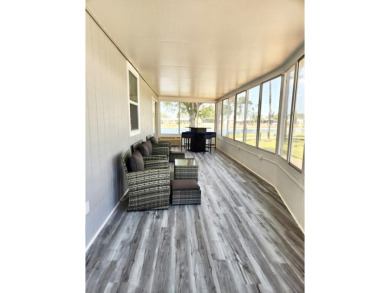 If you've been searching for a beautifully updated home in sunny on Lake Fairways Country Club in Florida - for sale on GolfHomes.com, golf home, golf lot