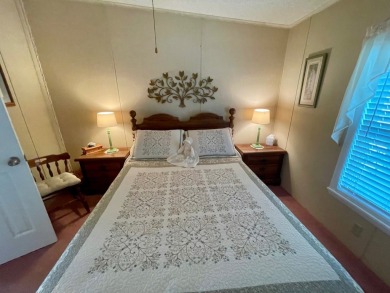Check this out!! This home has been meticulously kept with on Water Oak Country Club Estates in Florida - for sale on GolfHomes.com, golf home, golf lot