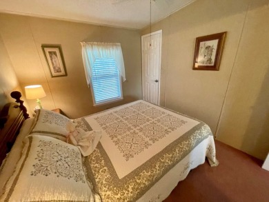 Check this out!! This home has been meticulously kept with on Water Oak Country Club Estates in Florida - for sale on GolfHomes.com, golf home, golf lot
