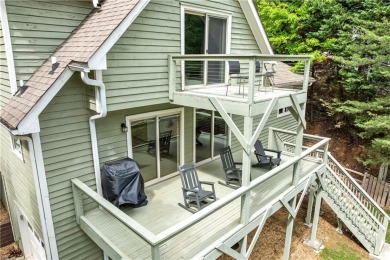 This stunning home offers privacy and views of Lake Arrowhead on The Highlands Course at Lake Arrowhead in Georgia - for sale on GolfHomes.com, golf home, golf lot