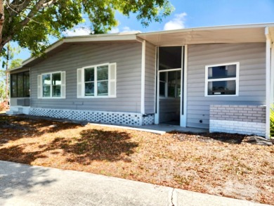 If you've been searching for a beautifully updated home in sunny on Lake Fairways Country Club in Florida - for sale on GolfHomes.com, golf home, golf lot