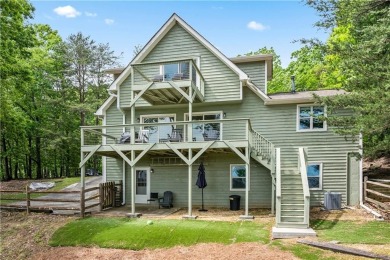 This stunning home offers privacy and views of Lake Arrowhead on The Highlands Course at Lake Arrowhead in Georgia - for sale on GolfHomes.com, golf home, golf lot