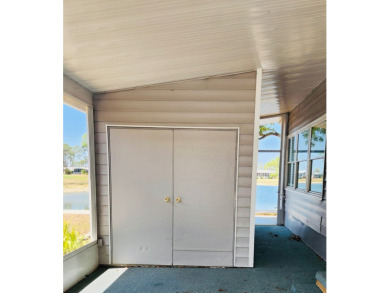 If you've been searching for a beautifully updated home in sunny on Lake Fairways Country Club in Florida - for sale on GolfHomes.com, golf home, golf lot