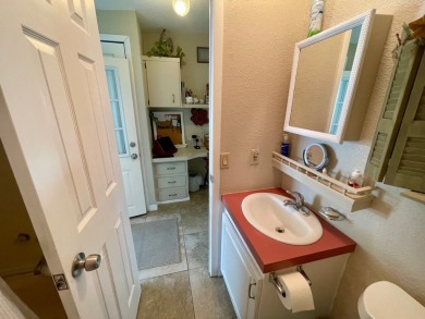 Check this out!! This home has been meticulously kept with on Water Oak Country Club Estates in Florida - for sale on GolfHomes.com, golf home, golf lot
