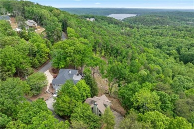 This stunning home offers privacy and views of Lake Arrowhead on The Highlands Course at Lake Arrowhead in Georgia - for sale on GolfHomes.com, golf home, golf lot