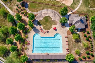 This stunning home offers privacy and views of Lake Arrowhead on The Highlands Course at Lake Arrowhead in Georgia - for sale on GolfHomes.com, golf home, golf lot