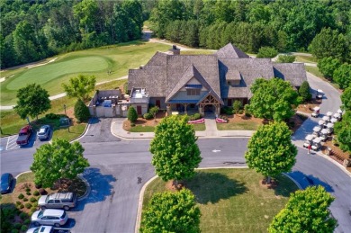 This stunning home offers privacy and views of Lake Arrowhead on The Highlands Course at Lake Arrowhead in Georgia - for sale on GolfHomes.com, golf home, golf lot