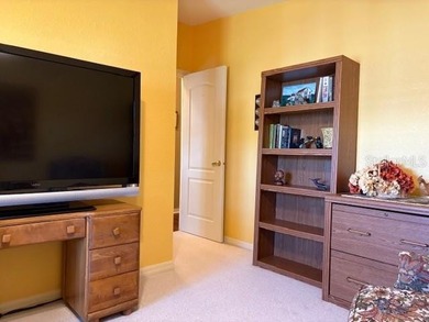 Come and take a look at this large triple-wide manufactured home on Country Club of Mount Dora in Florida - for sale on GolfHomes.com, golf home, golf lot