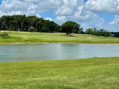 Check this out!! This home has been meticulously kept with on Water Oak Country Club Estates in Florida - for sale on GolfHomes.com, golf home, golf lot