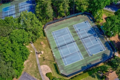 This stunning home offers privacy and views of Lake Arrowhead on The Highlands Course at Lake Arrowhead in Georgia - for sale on GolfHomes.com, golf home, golf lot