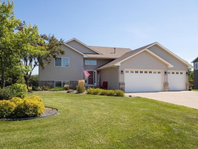 Nestled in a serene neighborhood, this meticulously maintained on Chisago Lakes Golf Course in Minnesota - for sale on GolfHomes.com, golf home, golf lot