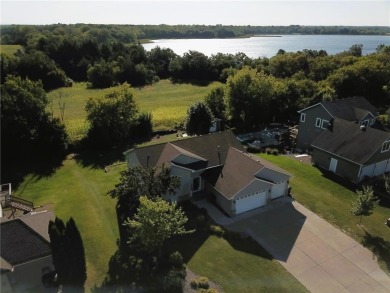 Nestled in a serene neighborhood, this meticulously maintained on Chisago Lakes Golf Course in Minnesota - for sale on GolfHomes.com, golf home, golf lot