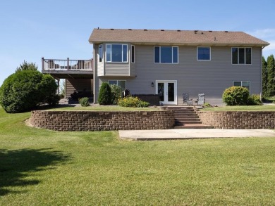 Nestled in a serene neighborhood, this meticulously maintained on Chisago Lakes Golf Course in Minnesota - for sale on GolfHomes.com, golf home, golf lot