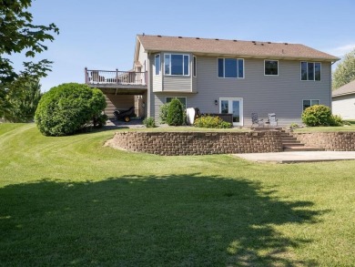 Nestled in a serene neighborhood, this meticulously maintained on Chisago Lakes Golf Course in Minnesota - for sale on GolfHomes.com, golf home, golf lot