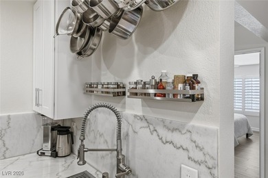 This stunning corner unit in the desirable Canyon Gate community on Canyon Gate Country Club in Nevada - for sale on GolfHomes.com, golf home, golf lot