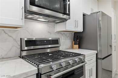 This stunning corner unit in the desirable Canyon Gate community on Canyon Gate Country Club in Nevada - for sale on GolfHomes.com, golf home, golf lot