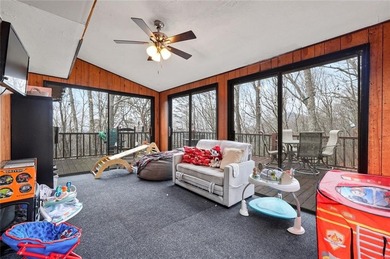 A storybook mountain bungalow offering the gentle ambiance of on Bent Tree Golf Course in Georgia - for sale on GolfHomes.com, golf home, golf lot