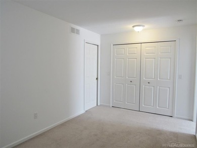 Beautiful Golf Course Community with views from your on St. Clair Shores Country Club in Michigan - for sale on GolfHomes.com, golf home, golf lot