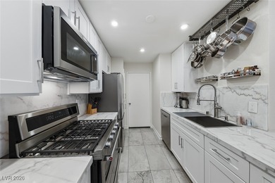 This stunning corner unit in the desirable Canyon Gate community on Canyon Gate Country Club in Nevada - for sale on GolfHomes.com, golf home, golf lot