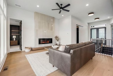 This new reverse 1.5-story Somerset plan by Elevate Design + on Heritage Park Golf Course in Kansas - for sale on GolfHomes.com, golf home, golf lot