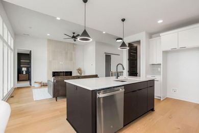 This new reverse 1.5-story Somerset plan by Elevate Design + on Heritage Park Golf Course in Kansas - for sale on GolfHomes.com, golf home, golf lot