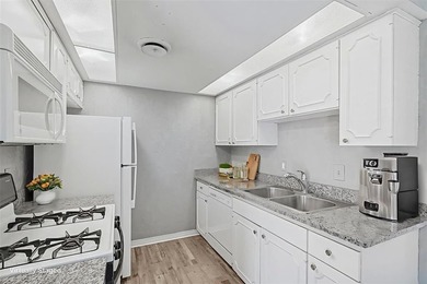 Fall in love with this updated 2nd (top) floor 1 bedroom, 1 bath on Prestonwood Country Club - Dallas County in Texas - for sale on GolfHomes.com, golf home, golf lot