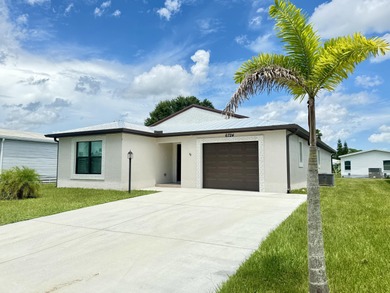 Rare to find new CBS home,  Metal Roof, Bright Split floor plan on Spanish Lakes Fairways in Florida - for sale on GolfHomes.com, golf home, golf lot