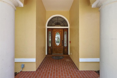 WECOME HOME!  The scenic views of this executive pool home will on Harbor Hills Country Club in Florida - for sale on GolfHomes.com, golf home, golf lot