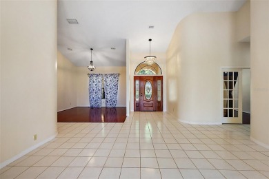 WECOME HOME!  The scenic views of this executive pool home will on Harbor Hills Country Club in Florida - for sale on GolfHomes.com, golf home, golf lot