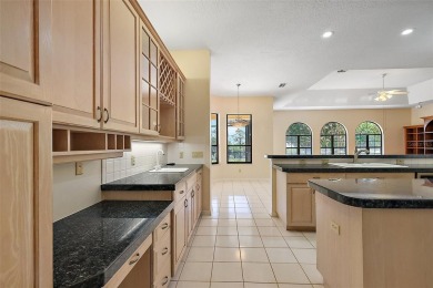 WECOME HOME!  The scenic views of this executive pool home will on Harbor Hills Country Club in Florida - for sale on GolfHomes.com, golf home, golf lot