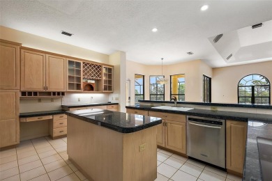 WECOME HOME!  The scenic views of this executive pool home will on Harbor Hills Country Club in Florida - for sale on GolfHomes.com, golf home, golf lot