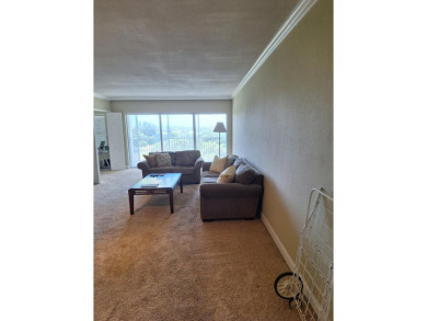 HUGE PRICE REDUCTION..E LIVE THE LIFESTYLE! Breathtaking on Palm-Aire Country Club and Resort - Palms in Florida - for sale on GolfHomes.com, golf home, golf lot