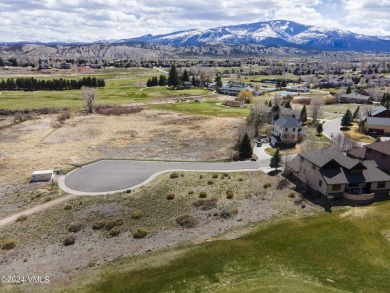 Lot for sale with approved architectural plans and paid HOA on Gypsum Creek Golf Course in Colorado - for sale on GolfHomes.com, golf home, golf lot