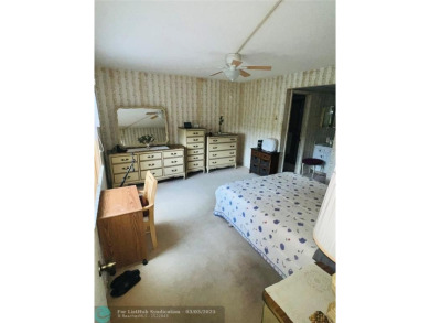 This charming two-bedroom, two-bath condo offers a cozy retreat on Sunrise Lakes Phase III in Florida - for sale on GolfHomes.com, golf home, golf lot