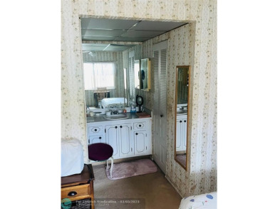 This charming two-bedroom, two-bath condo offers a cozy retreat on Sunrise Lakes Phase III in Florida - for sale on GolfHomes.com, golf home, golf lot