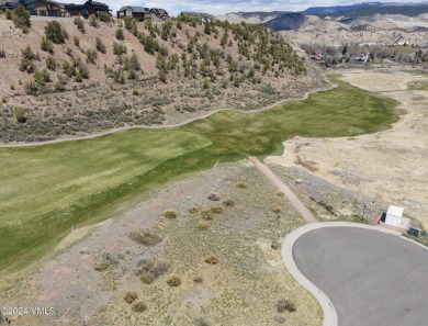 Lot for sale with approved architectural plans and paid HOA on Gypsum Creek Golf Course in Colorado - for sale on GolfHomes.com, golf home, golf lot