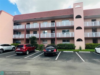 This charming two-bedroom, two-bath condo offers a cozy retreat on Sunrise Lakes Phase III in Florida - for sale on GolfHomes.com, golf home, golf lot
