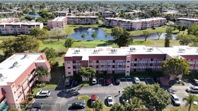 This charming two-bedroom, two-bath condo offers a cozy retreat on Sunrise Lakes Phase III in Florida - for sale on GolfHomes.com, golf home, golf lot
