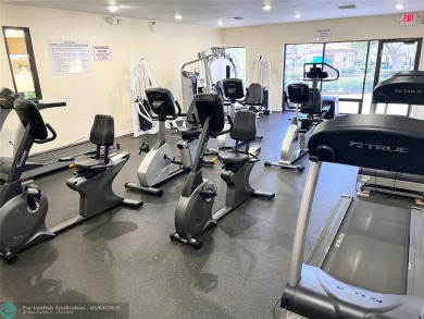 This charming two-bedroom, two-bath condo offers a cozy retreat on Sunrise Lakes Phase III in Florida - for sale on GolfHomes.com, golf home, golf lot