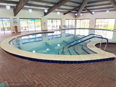 This charming two-bedroom, two-bath condo offers a cozy retreat on Sunrise Lakes Phase III in Florida - for sale on GolfHomes.com, golf home, golf lot