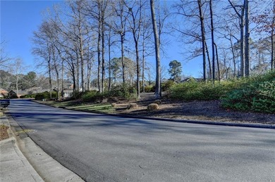 Nestled along the 5th fairway, this beautifully positioned home on Country Club of Roswell in Georgia - for sale on GolfHomes.com, golf home, golf lot