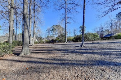 Nestled along the 5th fairway, this beautifully positioned home on Country Club of Roswell in Georgia - for sale on GolfHomes.com, golf home, golf lot