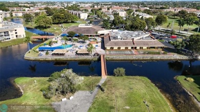 This charming two-bedroom, two-bath condo offers a cozy retreat on Sunrise Lakes Phase III in Florida - for sale on GolfHomes.com, golf home, golf lot