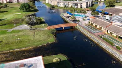 This charming two-bedroom, two-bath condo offers a cozy retreat on Sunrise Lakes Phase III in Florida - for sale on GolfHomes.com, golf home, golf lot