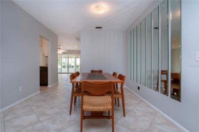 One or more photo(s) has been virtually staged. A lovely pond on Sandpiper Golf Club in Florida - for sale on GolfHomes.com, golf home, golf lot